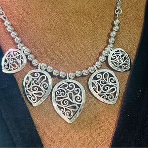 Silver colored Scrollwork Necklace by Dilliards